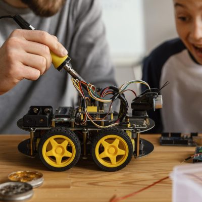 father-son-making-robot B. Tech ECE